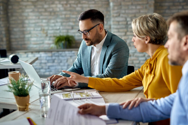 6893 small business owner discussing loan pre-approval with advisor