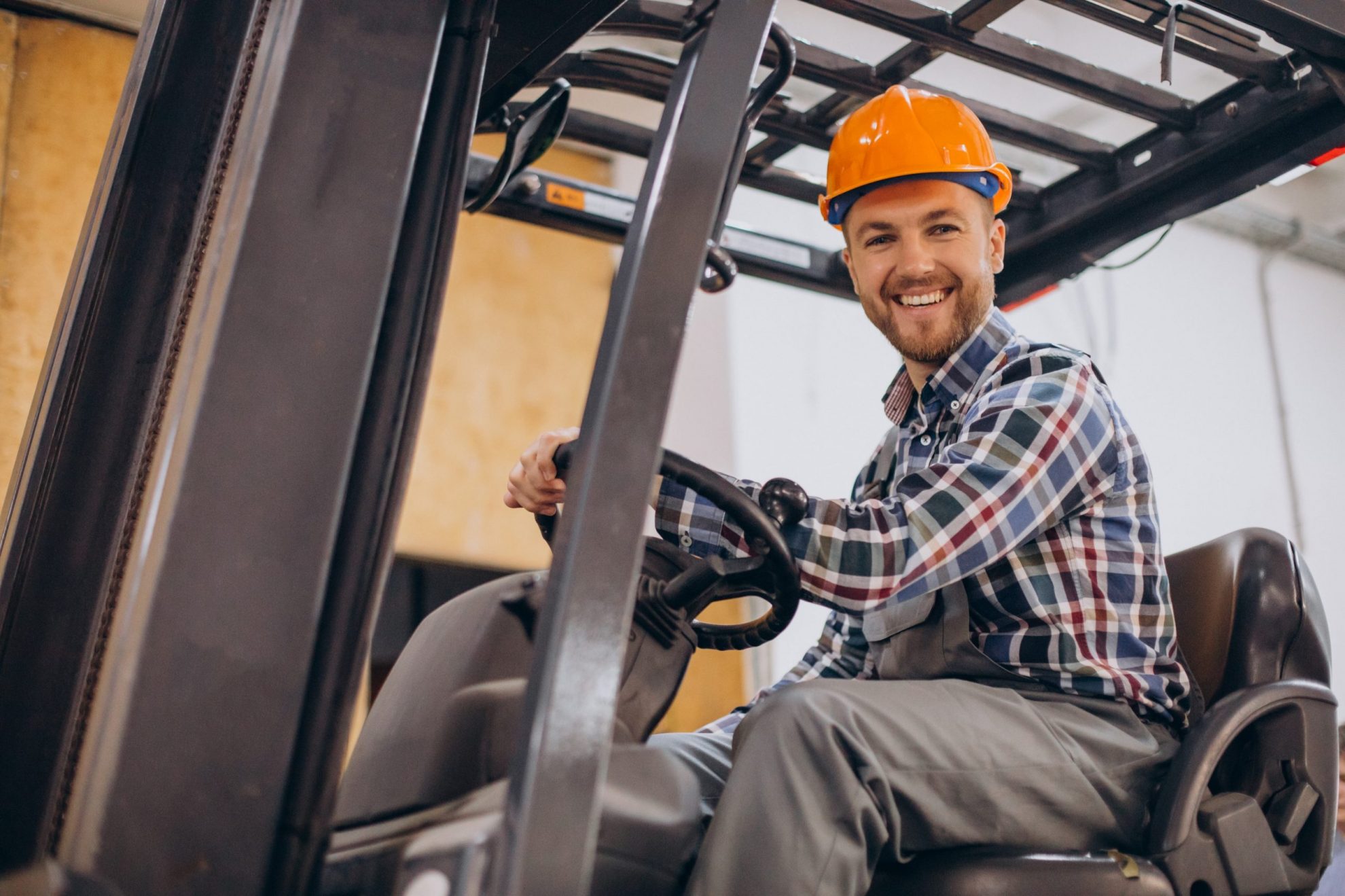 Photo of forklift operator illustrates blog; "How To Get Equipment Financing?"