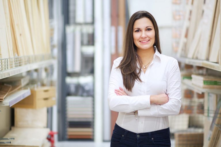 Image of confident business woman illustrates blog What Is a Business Loan?