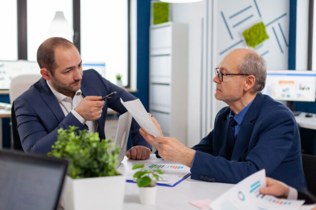 Buyer reviewing business acquisition financing for a fast closing