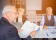 Owners reviewing financing options for a business succession plan