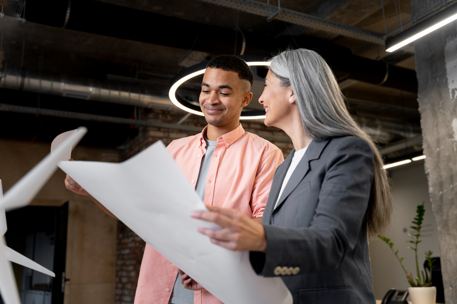 image-how-to-finance-a-business-renovation Business owners planning how to finance a business renovation