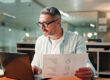 Business owner reviewing a personal financial profile for a commercial loan