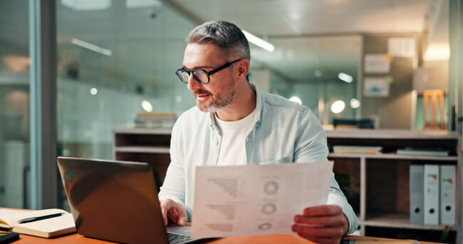 Business owner reviewing a personal financial profile for a commercial loan