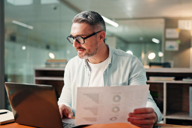 Business owner reviewing a personal financial profile for a commercial loan