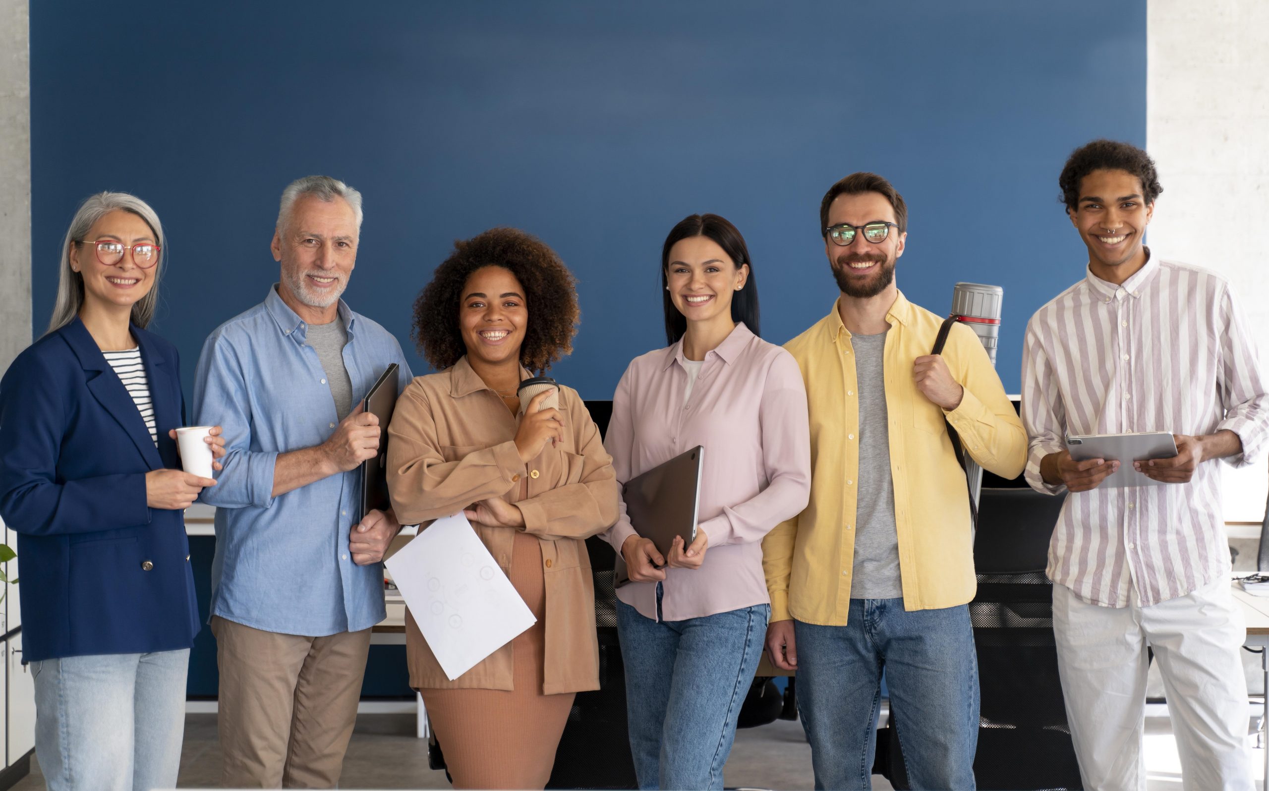 team-diverse-fp Diverse team of six (three men and three women) illustrates blog "Do SBA Loans Require Money Down?"