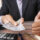 Business owner reviewing business cash reserves before applying for financing